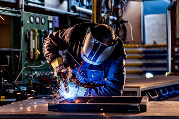 industrial worker welding at the factory
